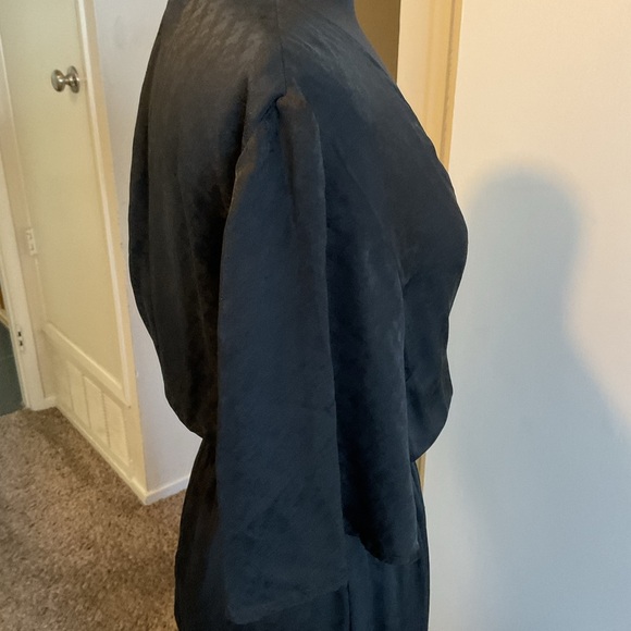 21. Reformation Black Jumpsuit with Sophisticated Wide-Leg Style Size 10 - Picture 13 of 13